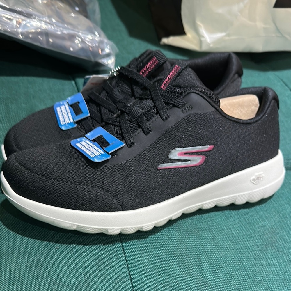 Skechers Black Sneakers with White Soles and Pink Accents